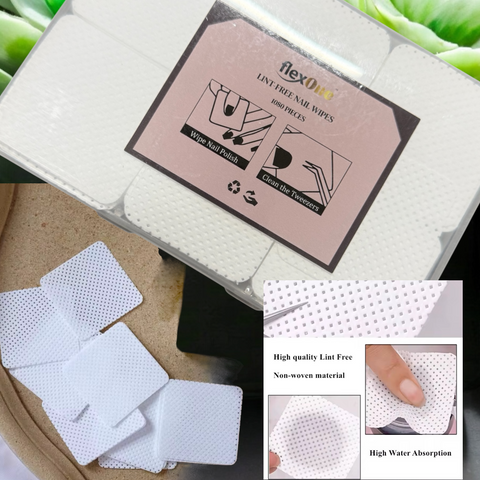 Box of lint-free nail wipes with packaging and usage instructions, displayed on a dark surface.